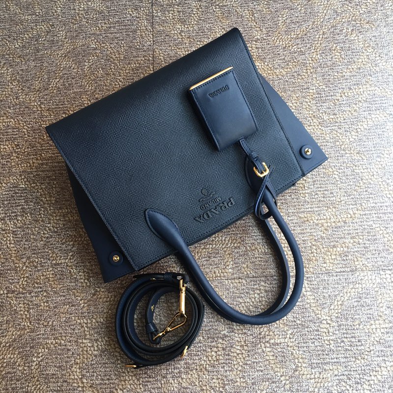 Pra*a top handle bags